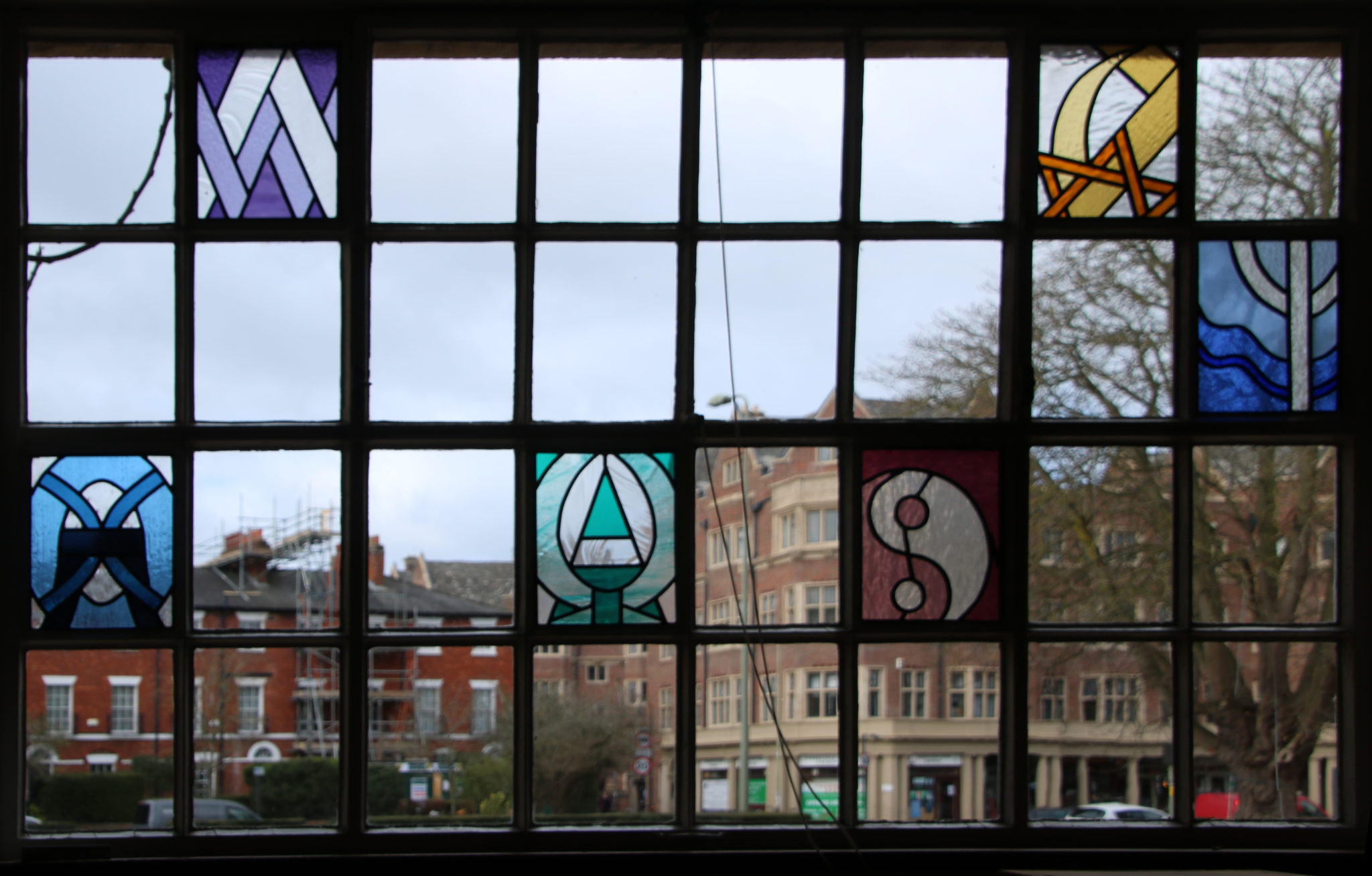 Iconic stained glass windows from St Anne's College West window.