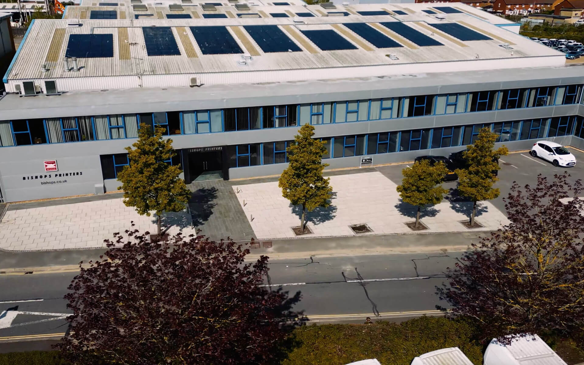 Aerial drone shot of the Bishops Printers building exterior.