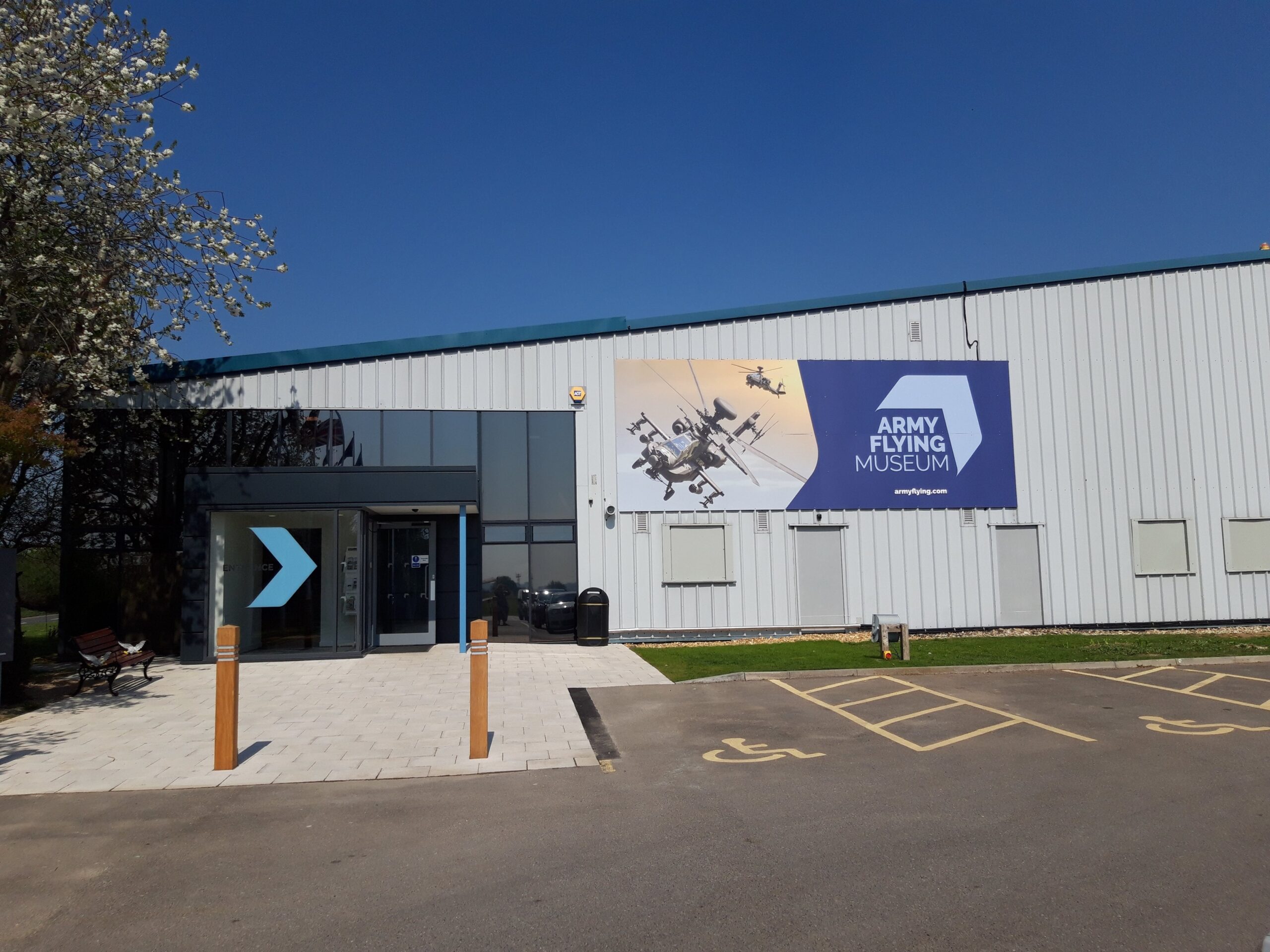 The Army Flying Museum building exterior image taken from the car park at the front of the building
