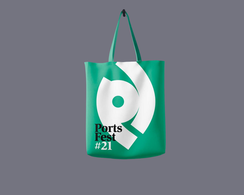 A mock-up of a green ports fest tote bag for Ports fest 21 showing the brand's logo