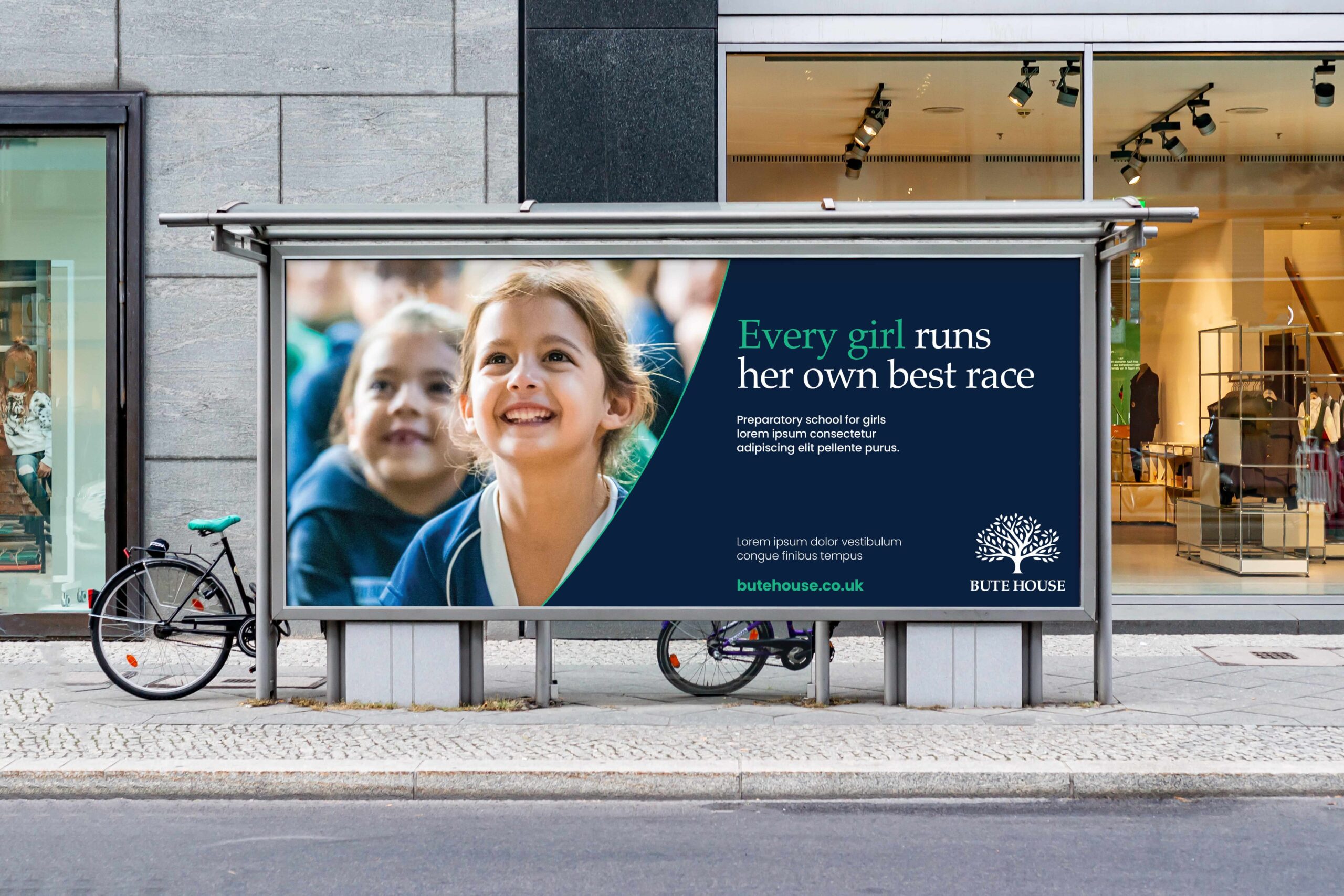 A mock-up of a Bute House billboard on the side of a bicycle shed.