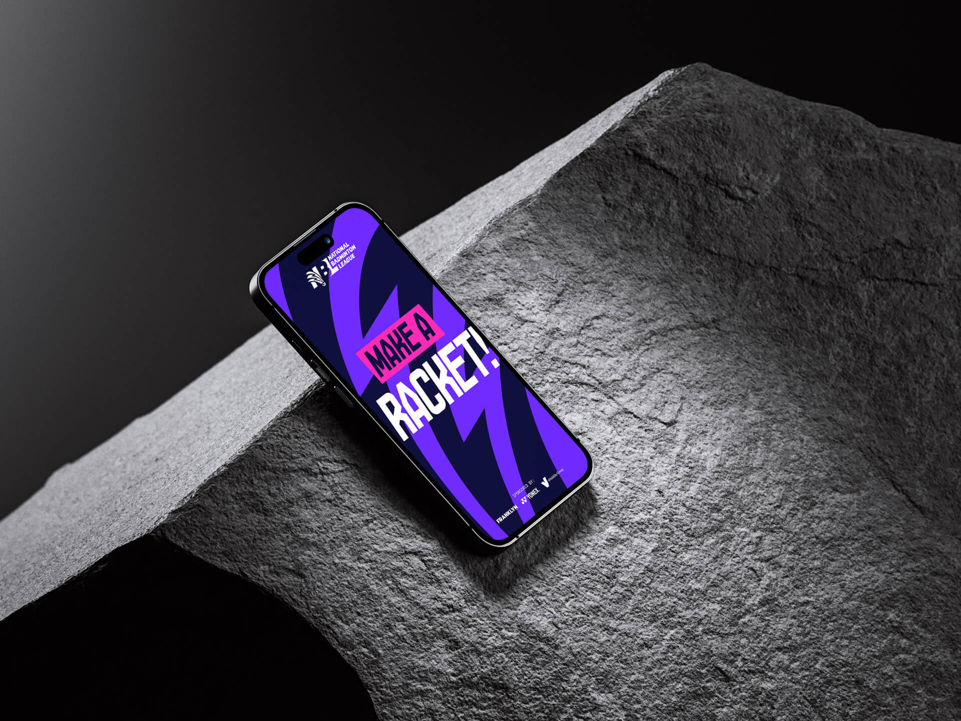 A mock-up of a mobile phone with the National Badminton League (NBL) logo and big text that says 'Make A Racket!'.
