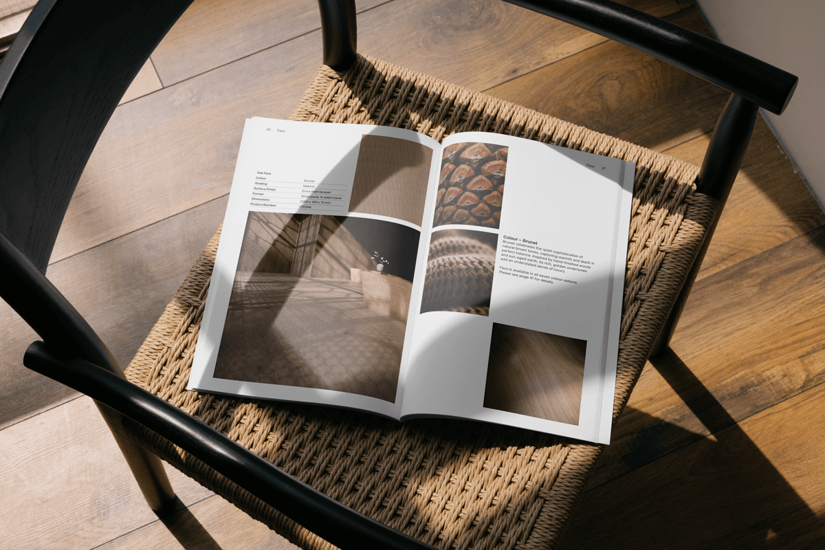 A mock-up showing the Parador 'Harmonia' brochure on the seat of a chair.