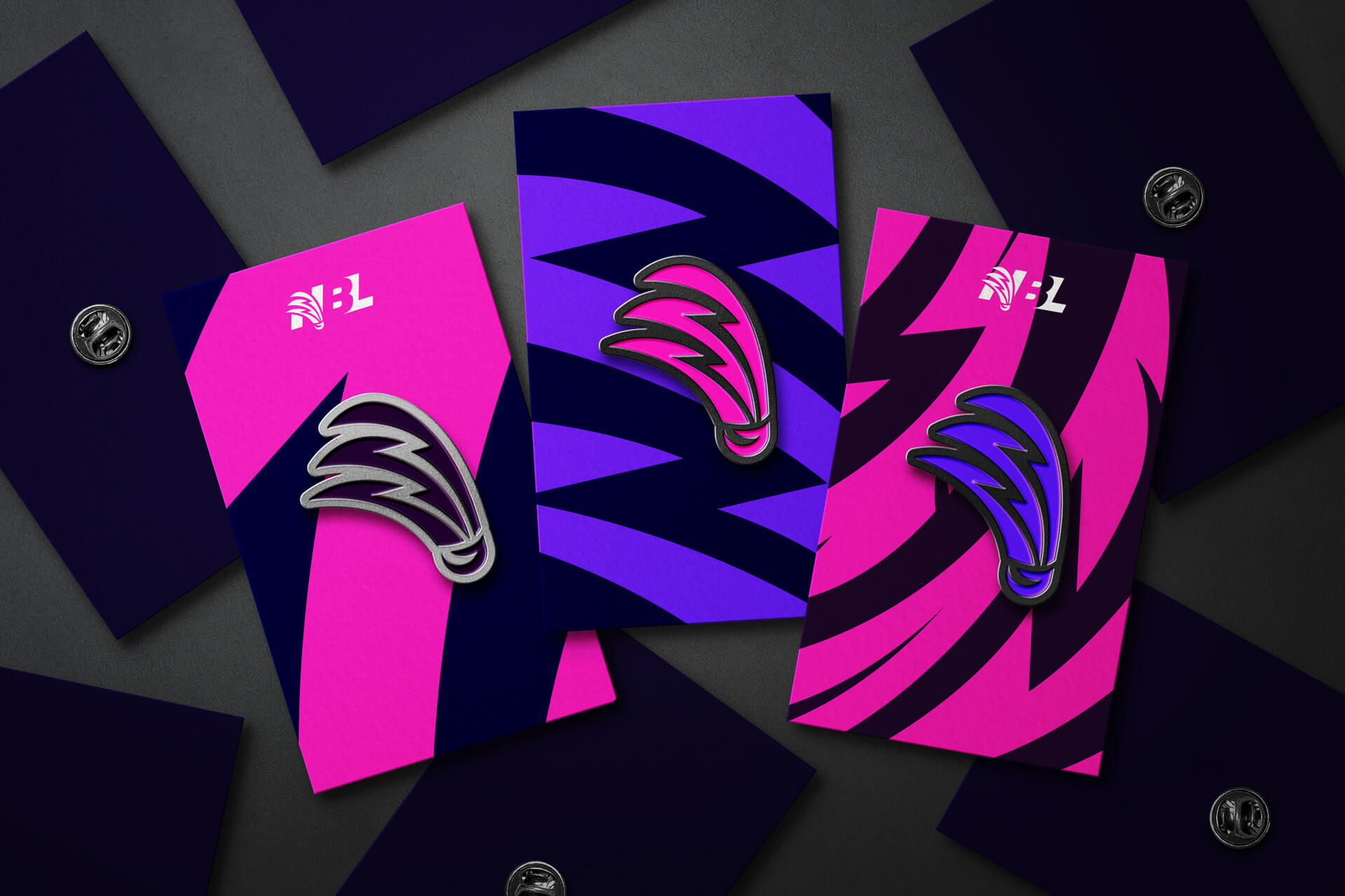 Mock-ups of pin badges for Badminton England's National Badminton League Logo