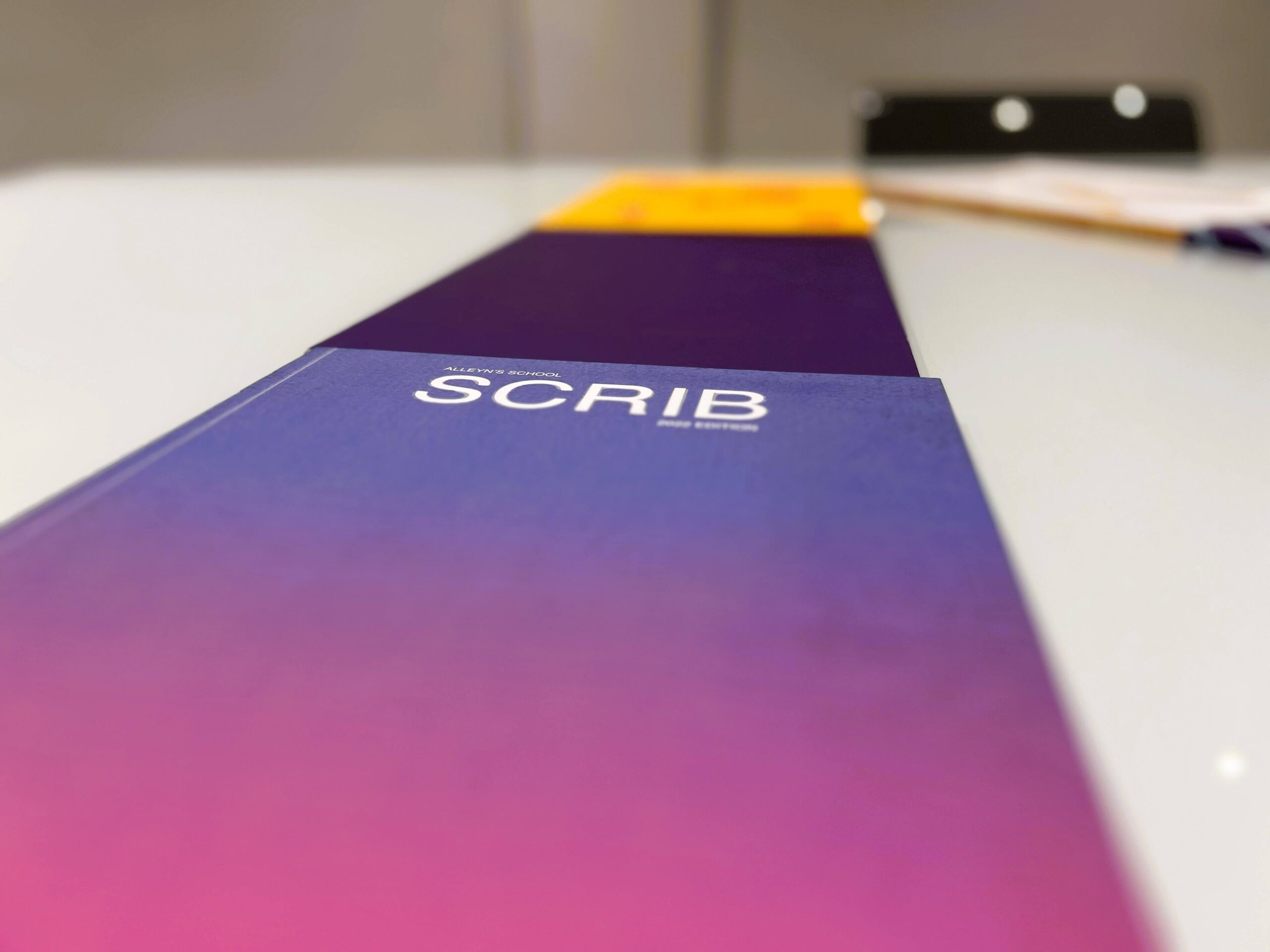 A mock-up of the Sport Industry Report 2026 spread titled 'a new era of football' a orange background.