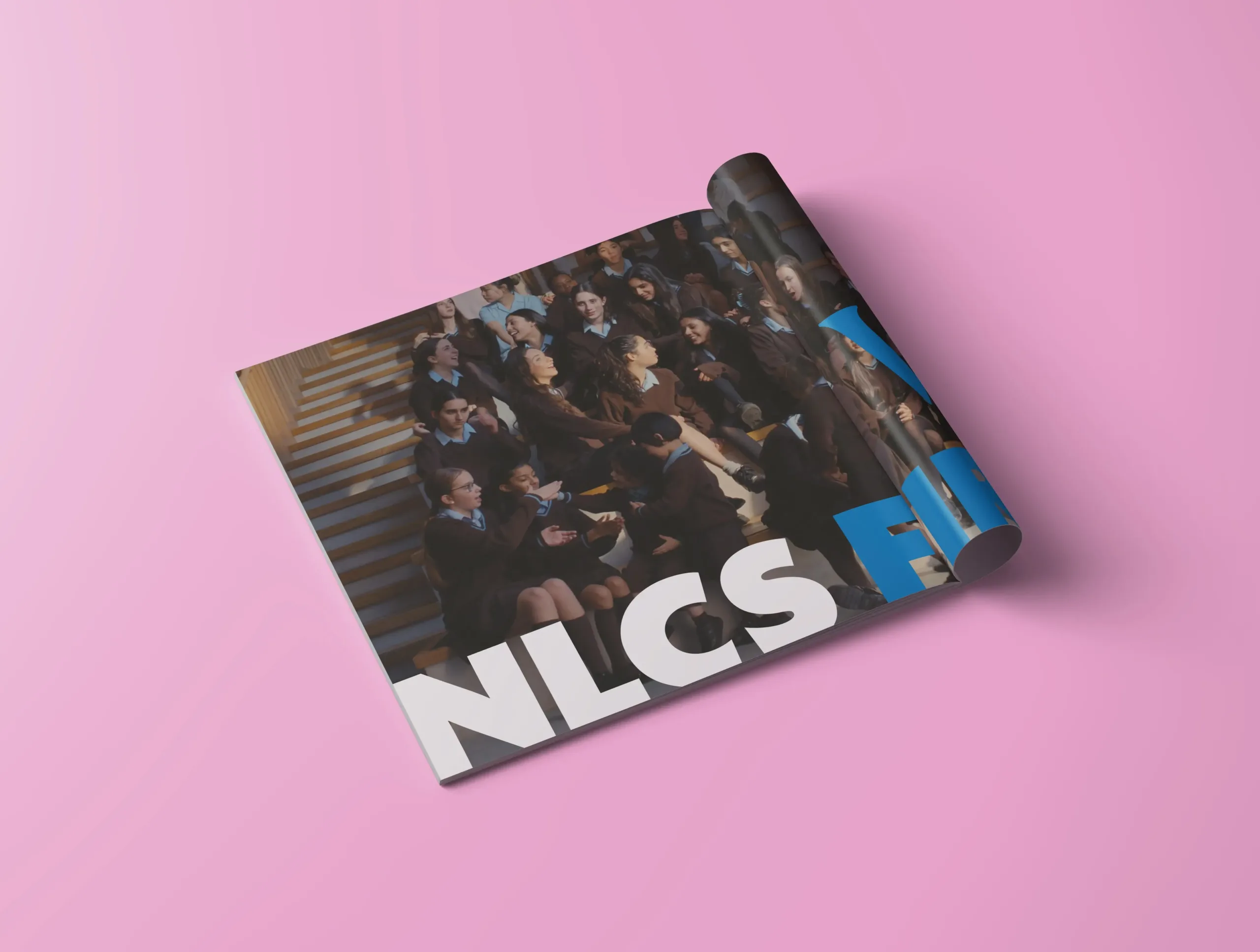 A mock-up of the NLCS North Londoner magazine opened.