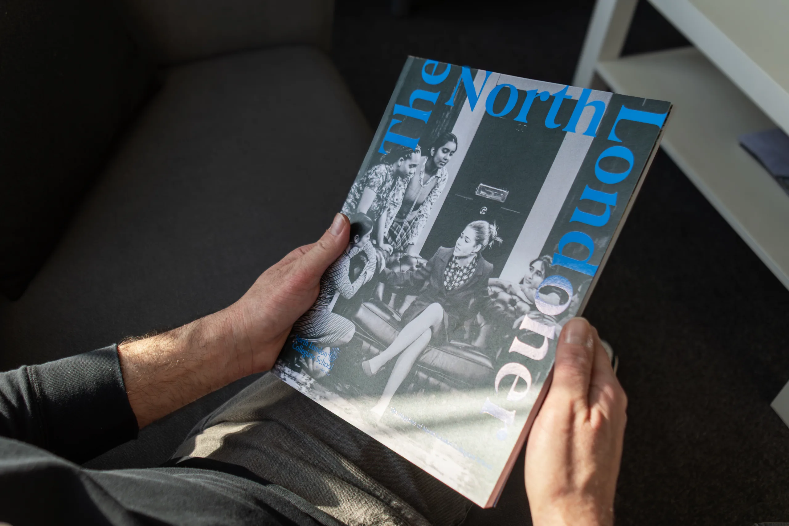 A photo of someone holding the North Londoner magazine looking at the front cover.